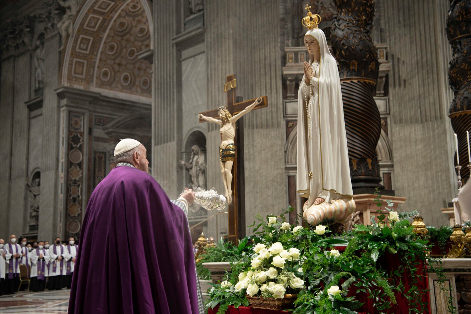 Pope Francis burns incense in front of a Marian statue after consecrating the world and, in particular, Ukraine and Russia to the Immaculate Heart of Mary during a Lenten penance service in St. Peter's Basilica at the Vatican March 25, 2022.
